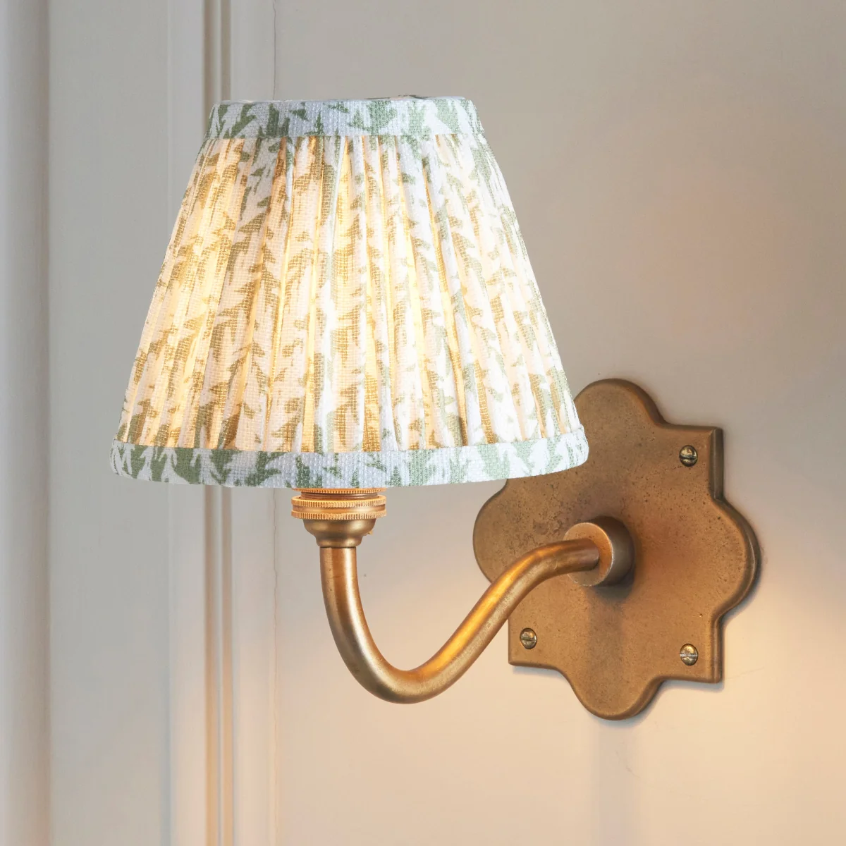 Anvil Curve Antique Brass Wall Light with Green Leaf Shade – image 1