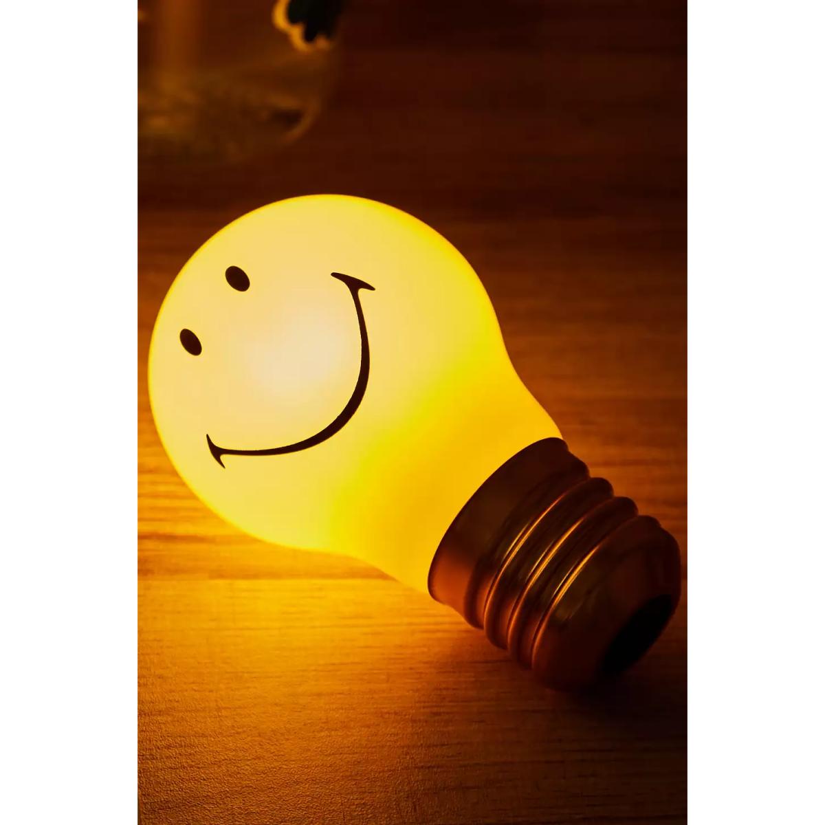 Smiley Lightbulb Lamp - Yellow 6.5cm x 12cm x 6.5cm at Urban Outfitters – image 3