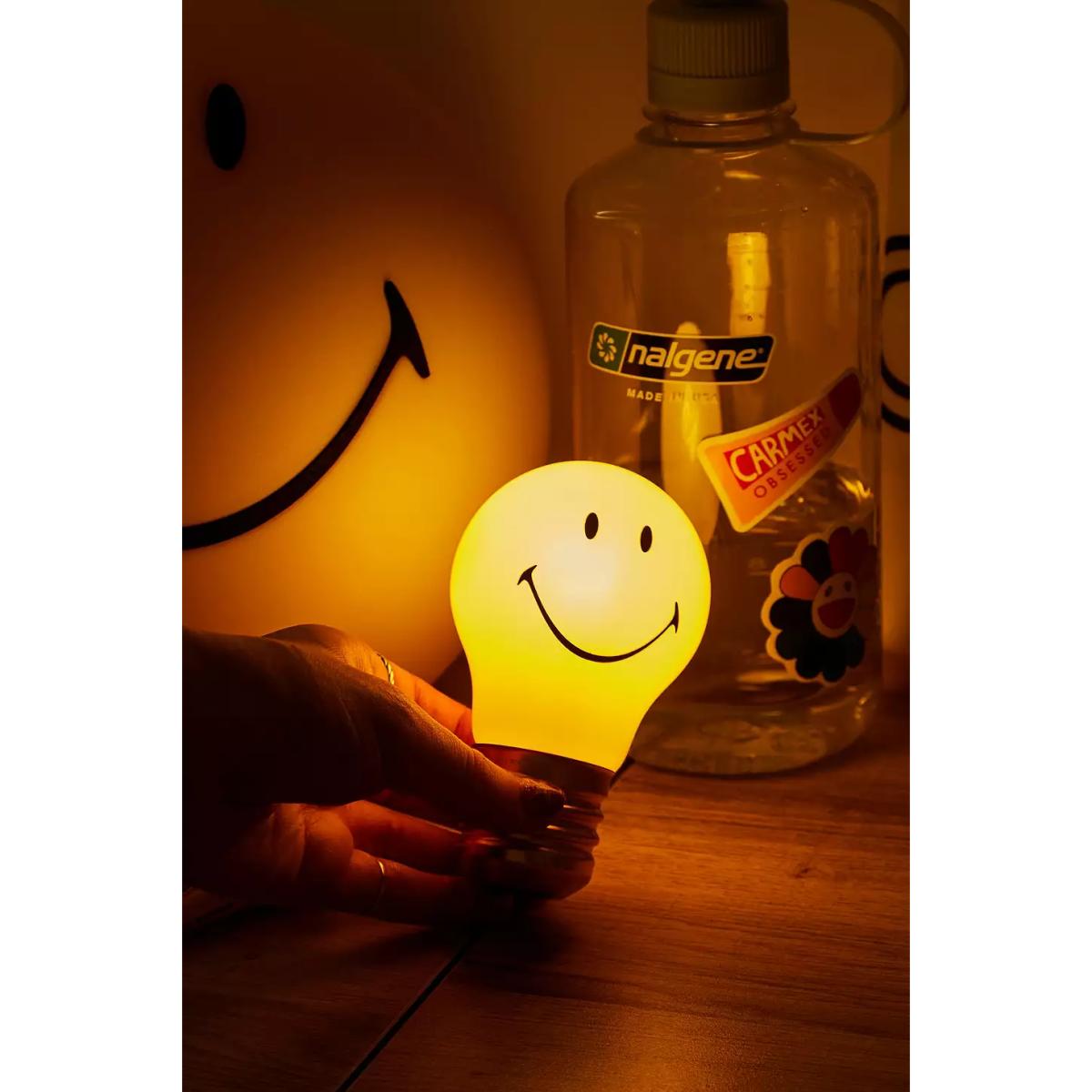 Smiley Lightbulb Lamp - Yellow 6.5cm x 12cm x 6.5cm at Urban Outfitters – image 4