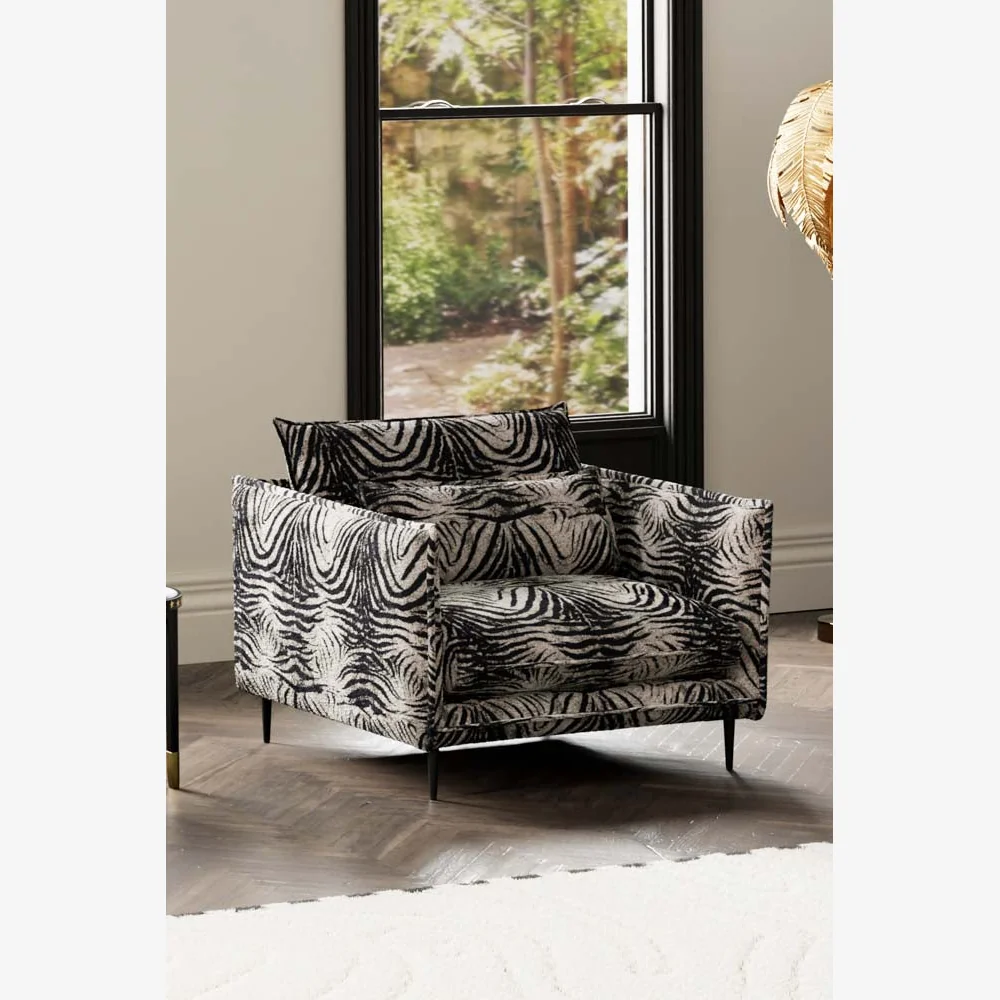 The Lola Snuggle Seat in Zebra Print Velvet