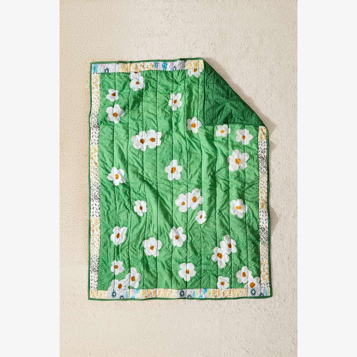 Meadowland Quilted Throw - Green 152cm x 127cm at Urban Outfitters – image 1