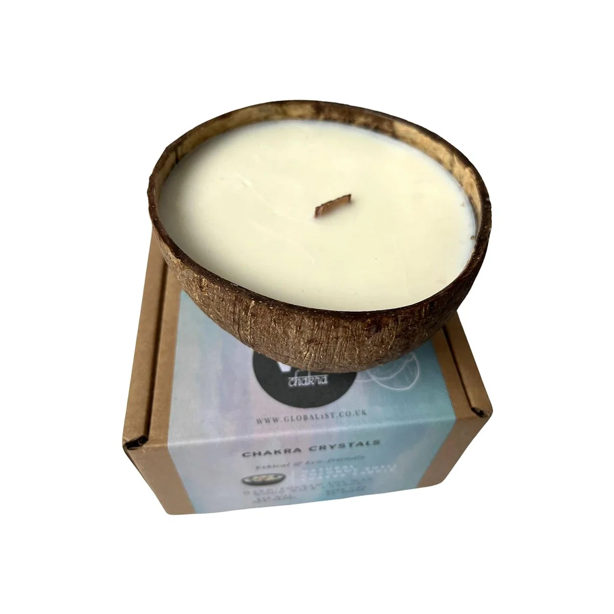 Coconut Shell Candle - White / Vanilla-scented candle in a coconut shell. No crystals included. Always burn on a stable, heat-resistant surface for a