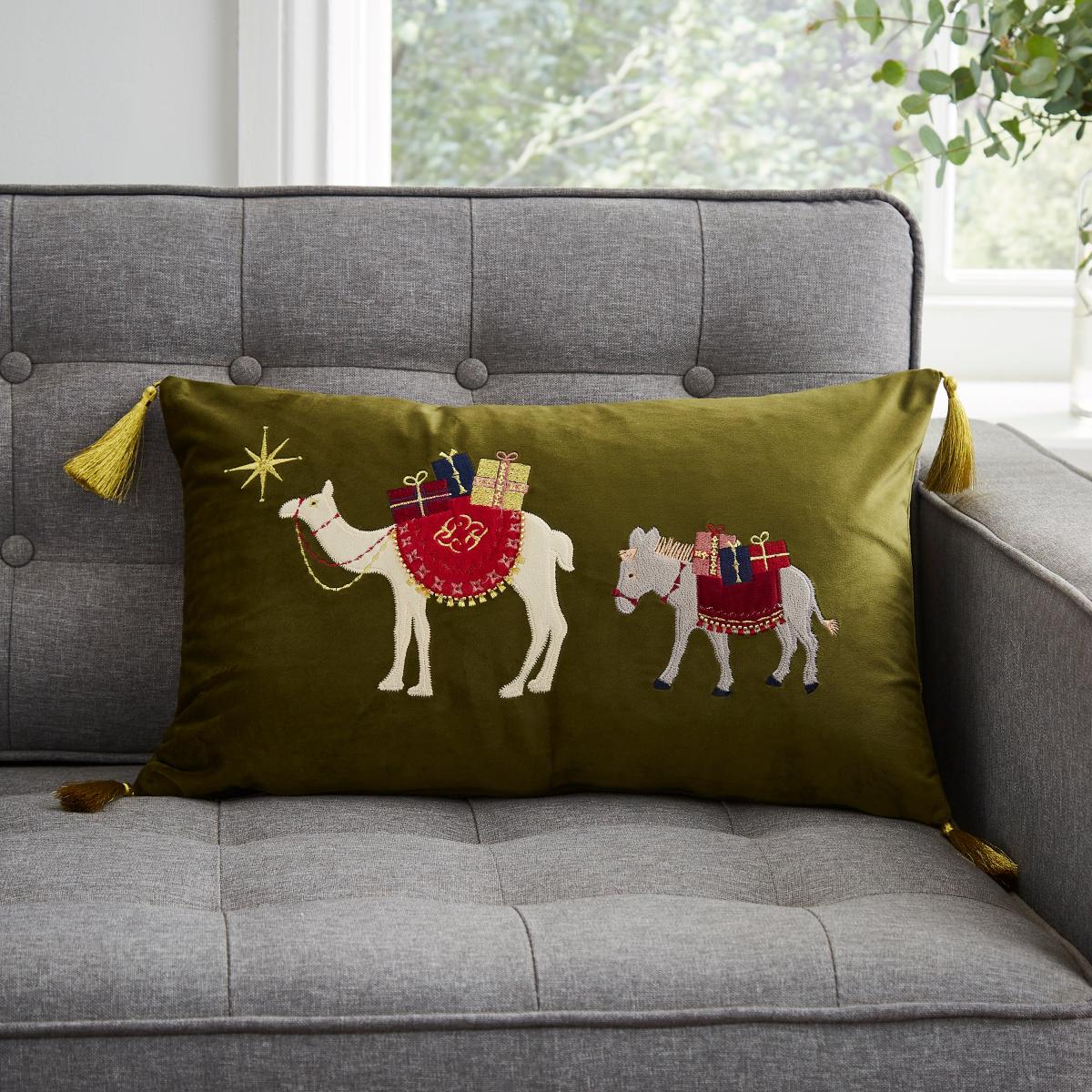 Festive Traveller Scene Olive Cushion Olive – image 1