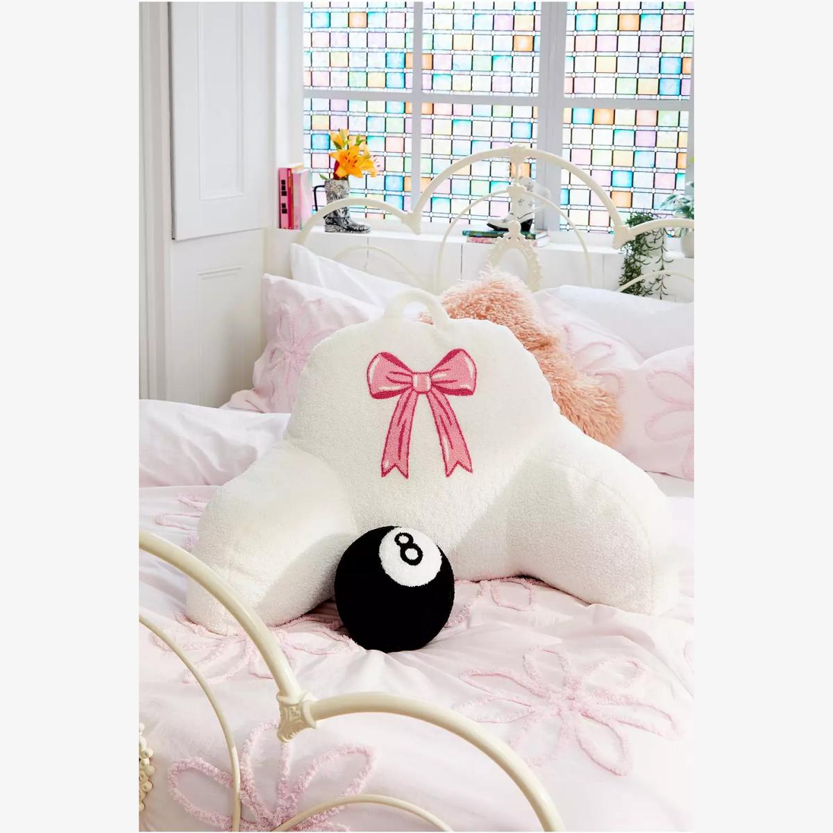 Pink Bow Boo Cushion - Ivory ALL at Urban Outfitters – image 1