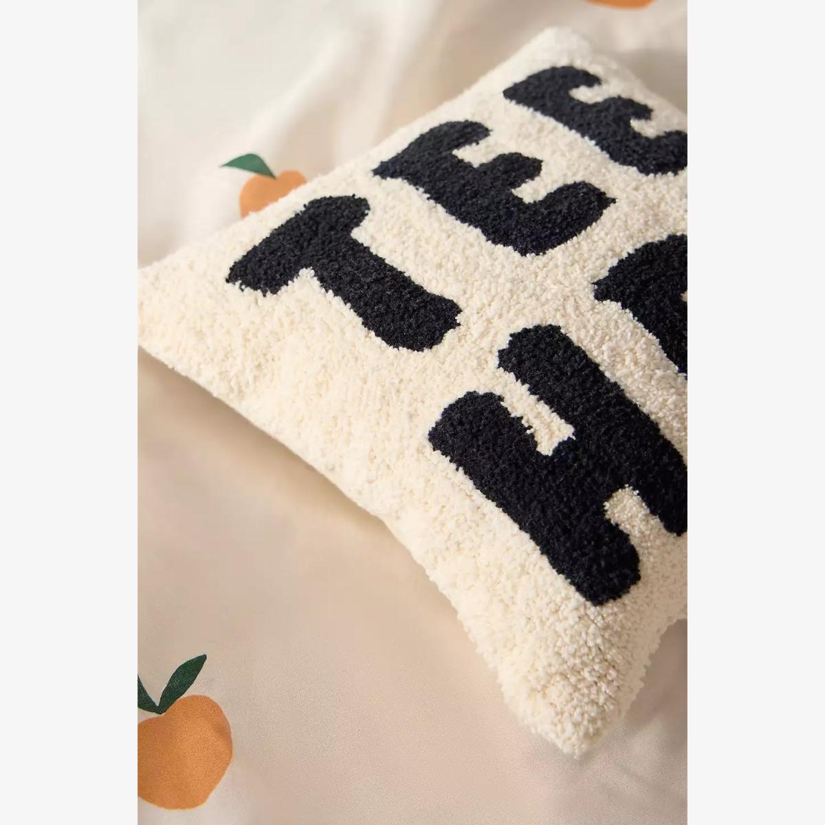 Tee Hee Mini Cushion - Black/White 25cm x 25cm at Urban Outfitters – image 1