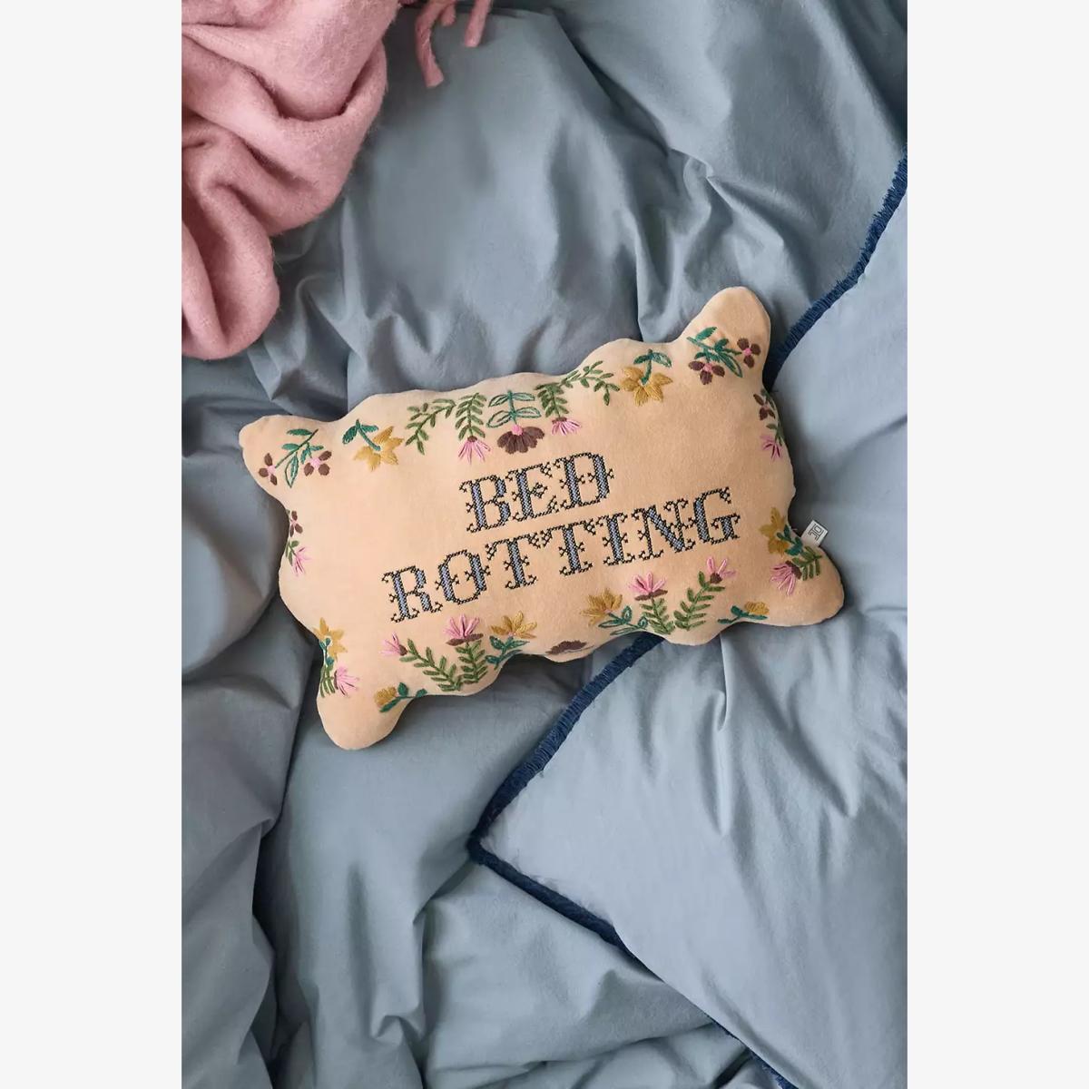 Bed Rotting Cushion 25.4cm x 40.6cm at Urban Outfitters – image 1