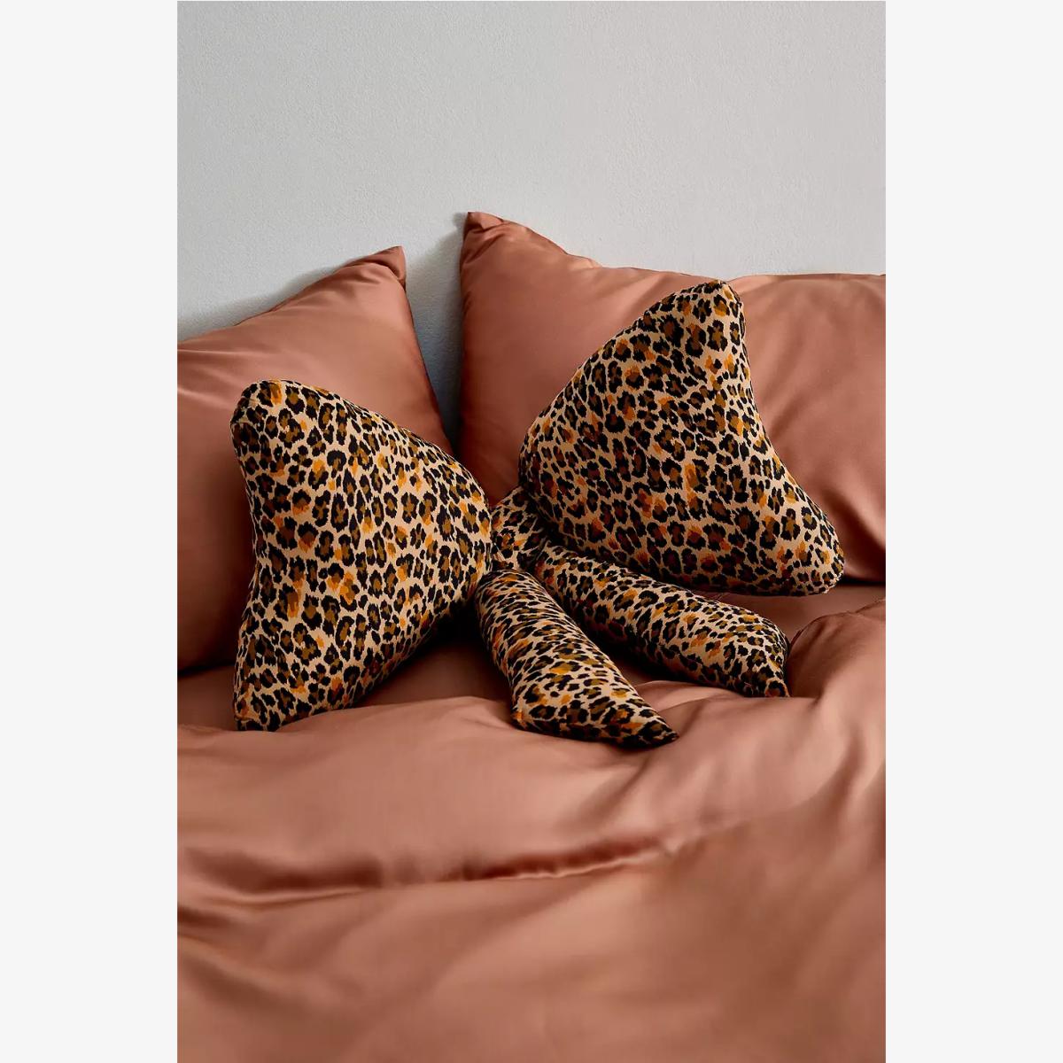 Leopard Print Bow Cushion - Neutral 67cm x 61cm at Urban Outfitters – image 1