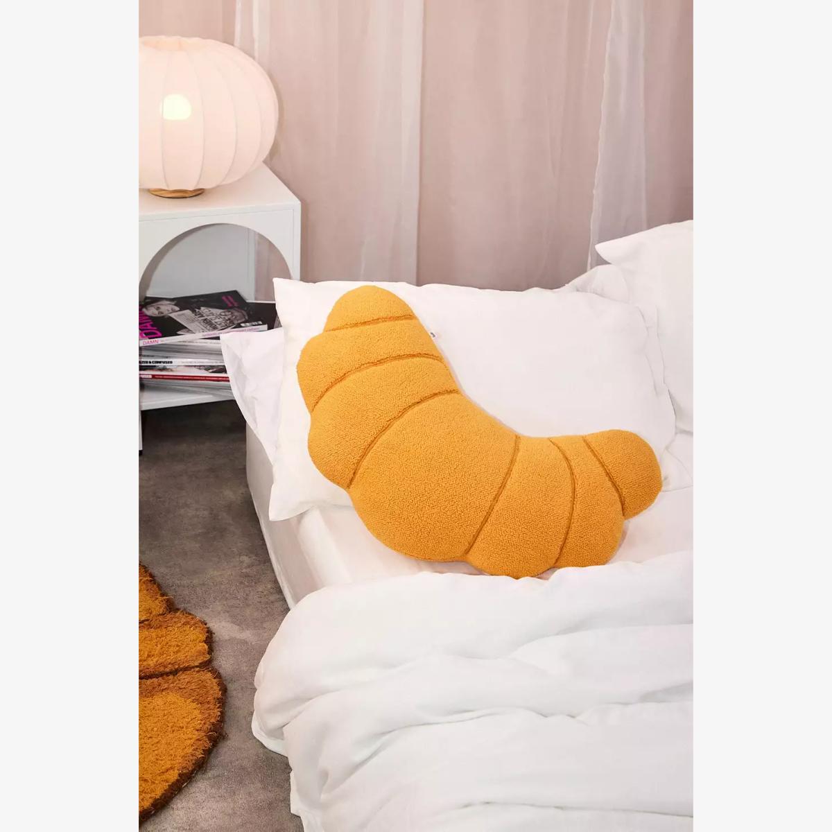 Croissant Cushion - Neutral 30.5cm x 61cm at Urban Outfitters – image 1