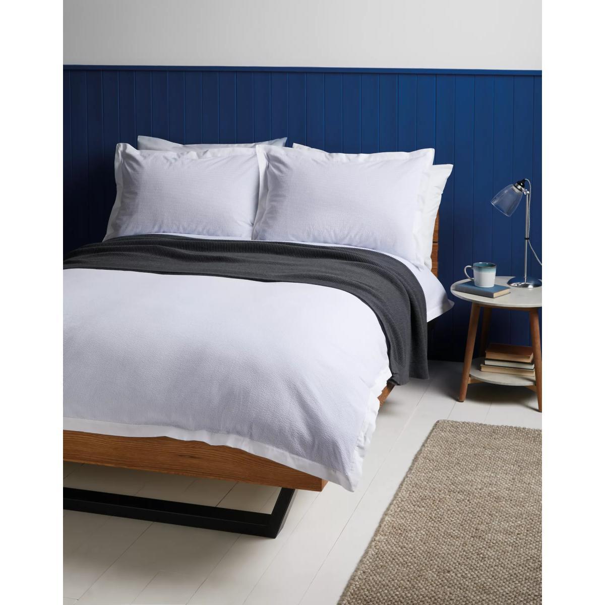 John Lewis & Partners Textured and Decorative Baby Seersucker Cotton Bedding, Blue/White – image 1