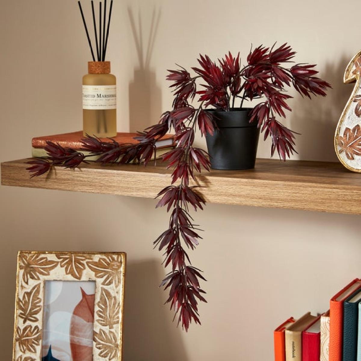 Artificial Trailing Burgundy Leaves in Black Plant Pot – image 1