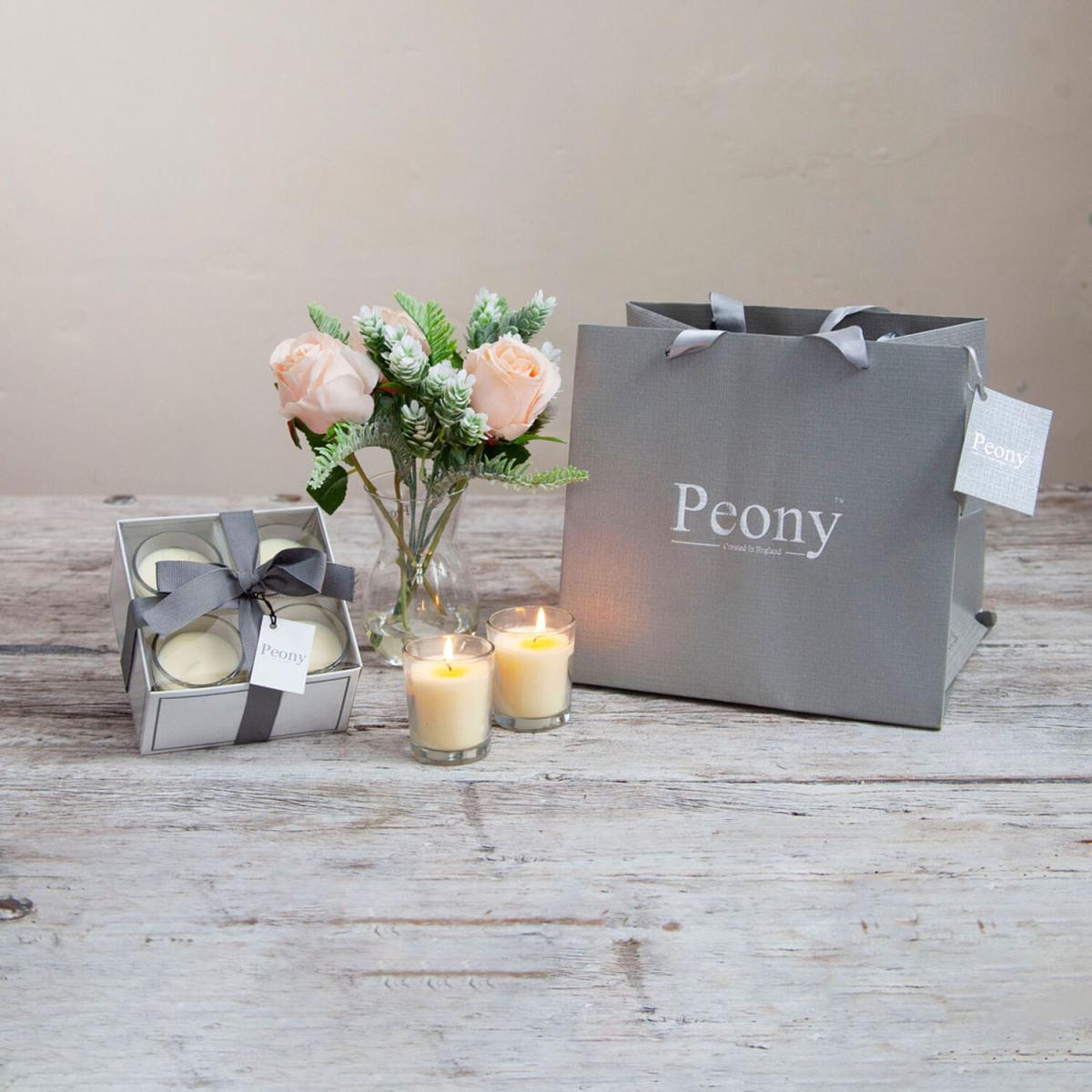 Peach roses winter foliage in a vase with candles gift bag by Peony - Soft peach with greens leaves – image 2