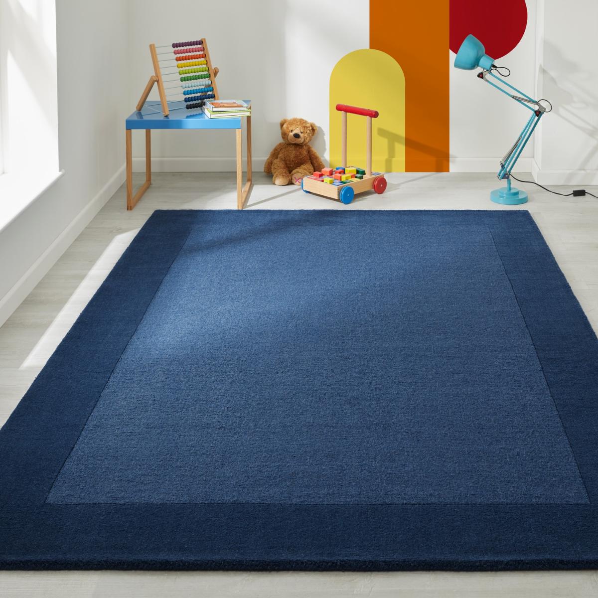 Colours Bordered Wool Rug in Navy Blue120x170cm – image 1