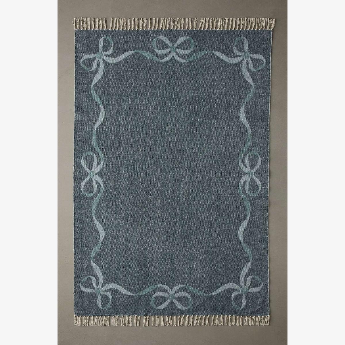 Pine Lacey Bow 5x7 Rug - Dark Grey at Urban Outfitters – image 1