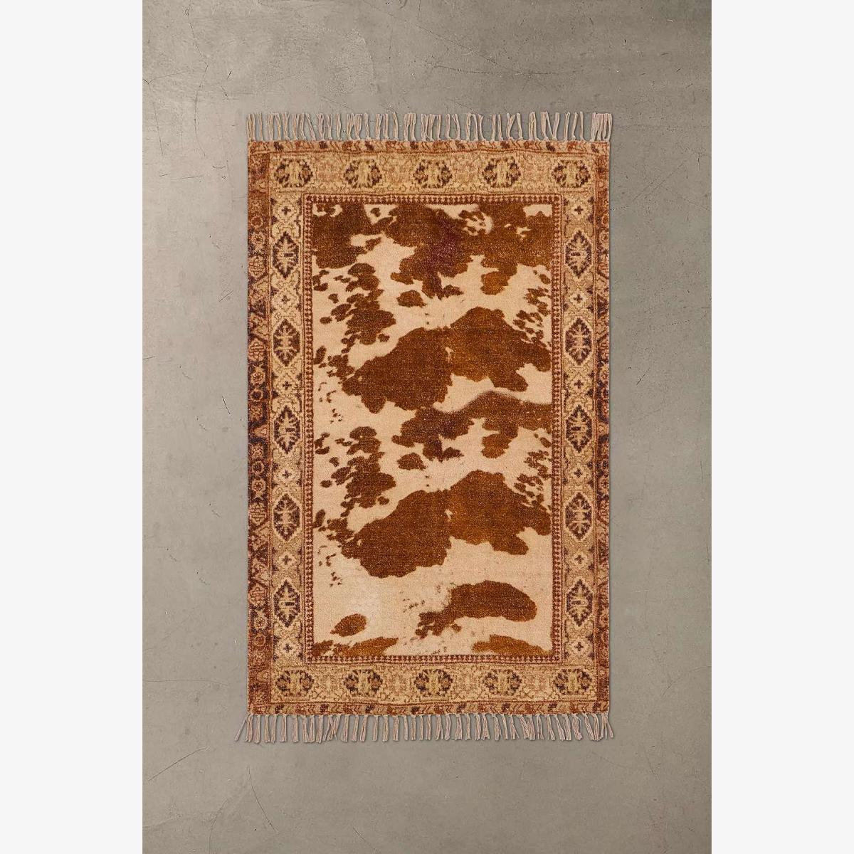 Leonore Cow 3x5 Rug - Neutral at Urban Outfitters – image 1