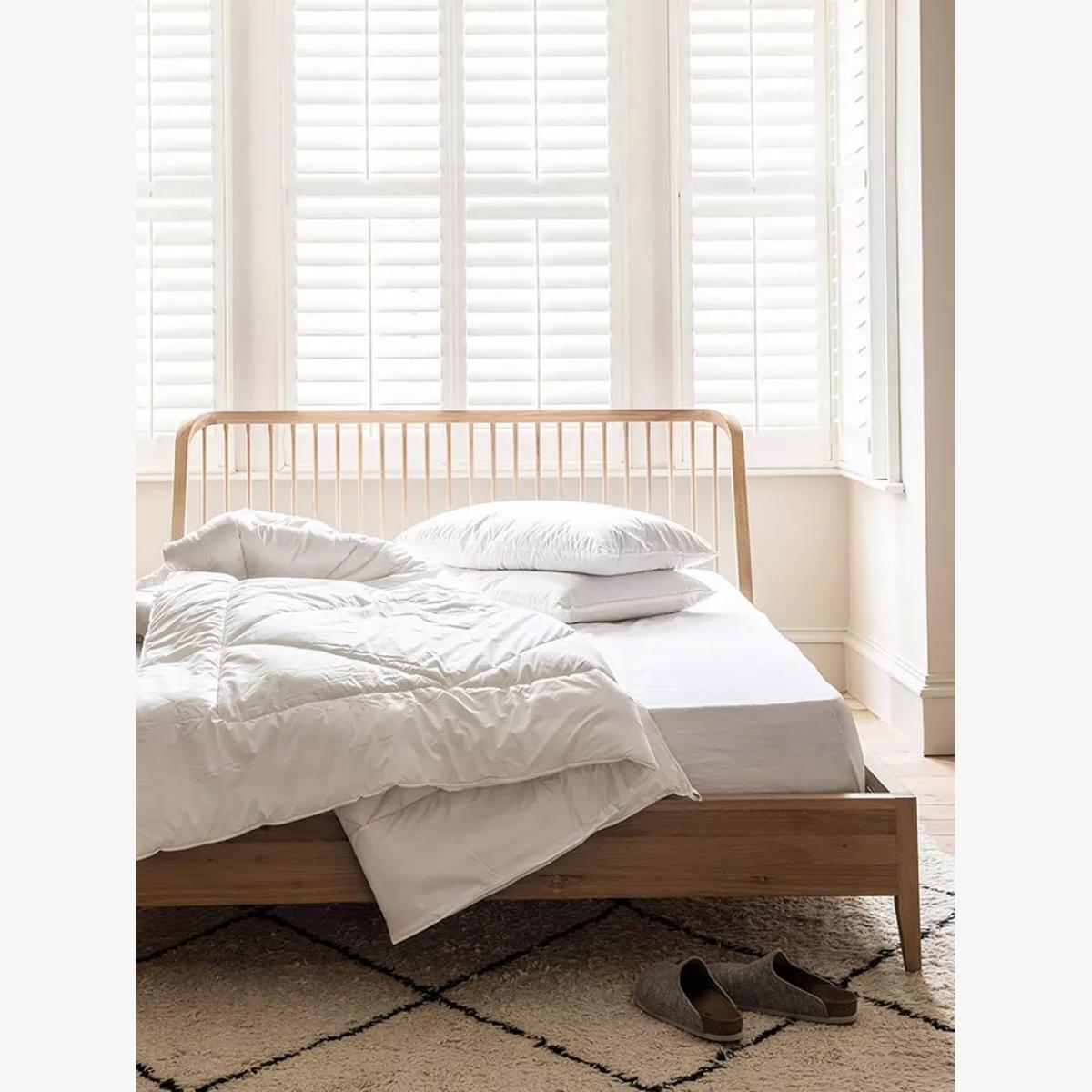 Piglet in Bed Merino Wool Square Pillow, Firm – image 1
