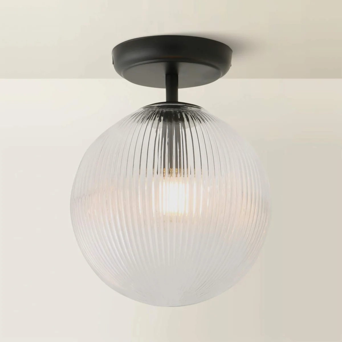 Kempton Flush Ceiling Light with Ribbed Globe Shade - Brushed Brass / Yes - Black – image 4