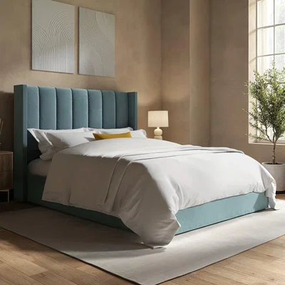 Furniture123 Blue Velvet King Size Ottoman Bed With Winged Headboard - Maddox