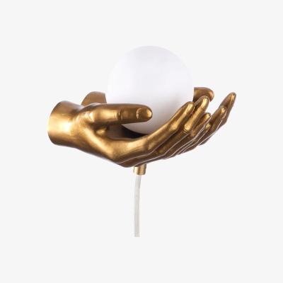 BHS.com Max Hands Holding Ball Wall or Table Lamp, Antique Brass