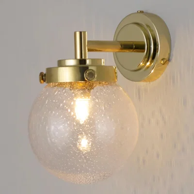 The Conran Shop Mini Globe Wall Light in Brass