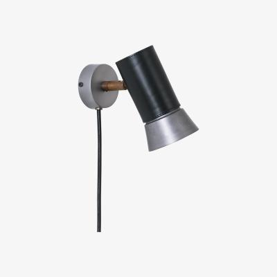 Nordic Nest Konsthantverk Kusk wall lamp Raw iron/black leather
