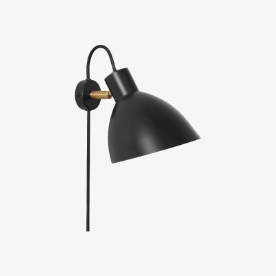 Nordic Nest Konsthantverk KH1 wall lamp Black matte raw brass