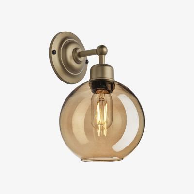 Olivia's Industville Orlando Tinted Glass Globe Amber Wall Light / 7 Inch Brass Holder