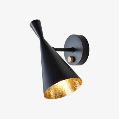 Olivia's Tom Dixon Beat Wall Light