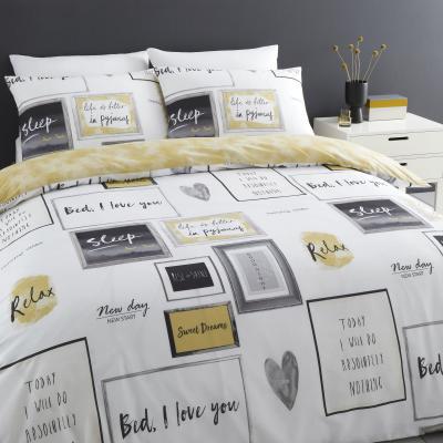 Dunelm Catherine Lansfield Sleep Dreams Ochre Reversible Duvet Cover and Pillowcase Set Black and white