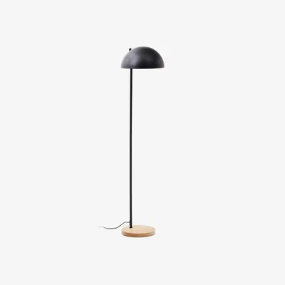 Kave Home Catlar ash wood and metal floor lamp in a black painted finish with a UK adapter