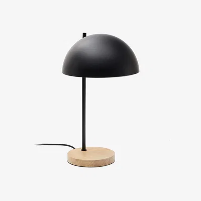 Kave Home Catlar ash wood and metal table lamp in a black painted finish with a UK adapter