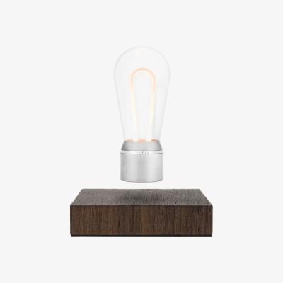 Made in Design Flyte Nikola Table lamp - / Levitating bulb by Flyte Silver/Natural wood/Metal