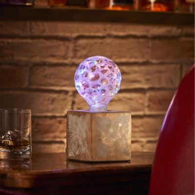 The Range Auraglow Mysa Bronzed Effect Stone Cement Bedside Lamp - Bronze / Starry Multi-Coloured LED Bulb