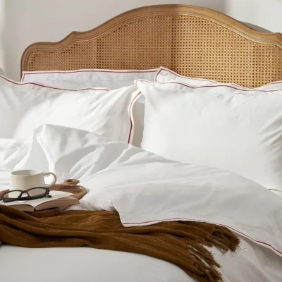 Feather & Black Kensington Ladder Stitch Pillowcase Pair, Rust