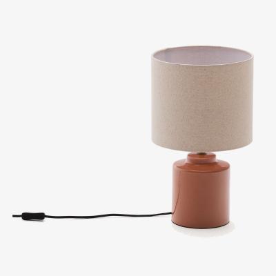 Kave Home Daeli ceramic table lamp with orange finish and beige cotton
