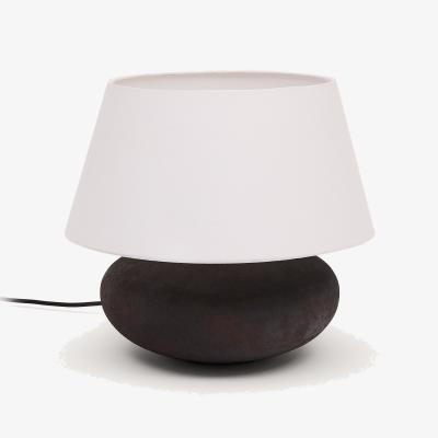 Kave Home Nessi metal table lamp in a black terracotta effect finish