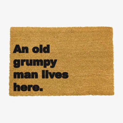 The Range Grumpy Man Lives Here Doormat - Black
