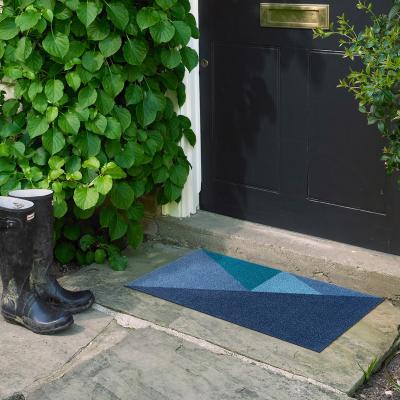 The Rug Seller Trendy Brush Outdoor Geo Doormat in Blue