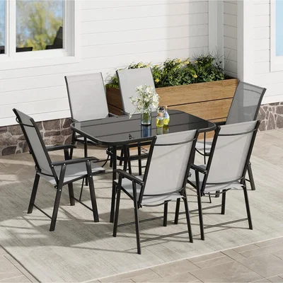 The Range Rectangular Tempered Glass Garden Table with Six Foldable Chairs - Black