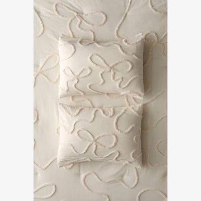 Urban Outfitters Wild Bows Tufted Duvet Set - Cream King at Urban Outfitters
