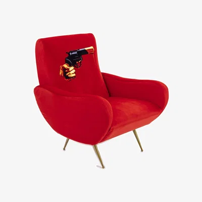 Amara wears Toiletpaper Toiletpaper Upholstered Wooden Armchair