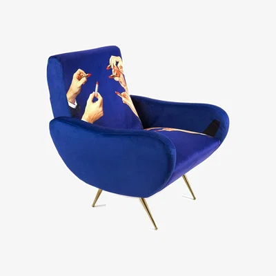 Amara wears Toiletpaper Toiletpaper Upholstered Wooden Armchair