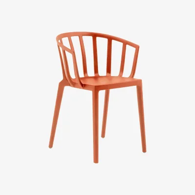 Made in Design Venice Stackable armchair plastic material orange - Kartell