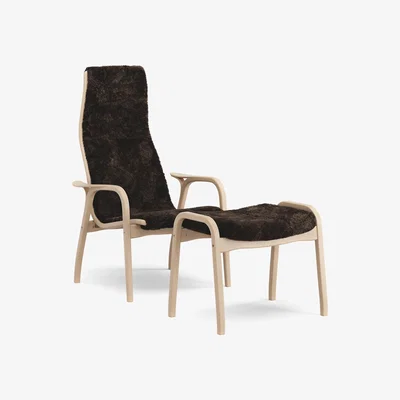 Nordic Nest Swedese Lamino armchair and footstool varnished beech/sheepskin Espresso (brown)