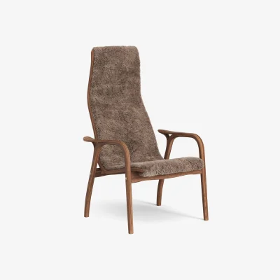 Nordic Nest Swedese Lamino armchair Sheepskin Sahara-lacquered walnut
