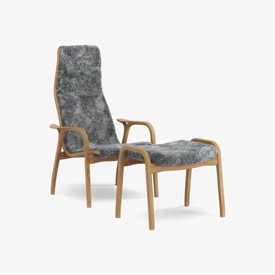 Nordic Nest Swedese Lamino armchair and footstool oiled oak/sheepskin Scandinavian Grey