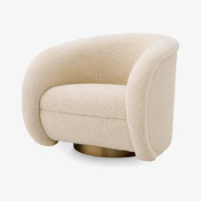 Olivia's Eichholtz Cristo Swivel Chair in Brisbane Cream