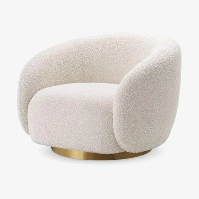 Olivia's Eichholtz Brice Swivel Chair in Boucle Cream