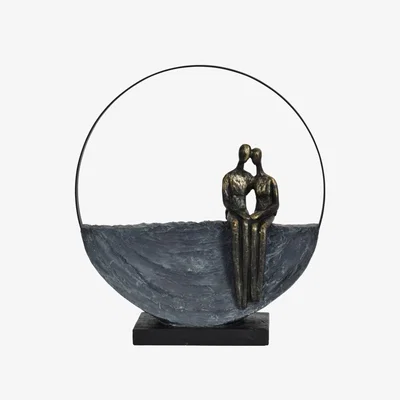 Downtown Libra Couple Encircles Sculpture