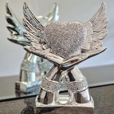 The Range Crushed Diamond Heart With Wings In Hands Ornament - Silver