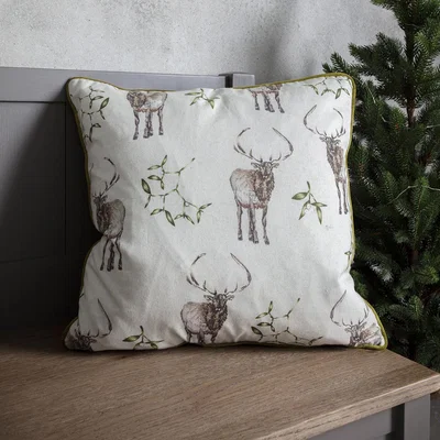 Dunelm Reindeer and Mistletoe Cushion Natural